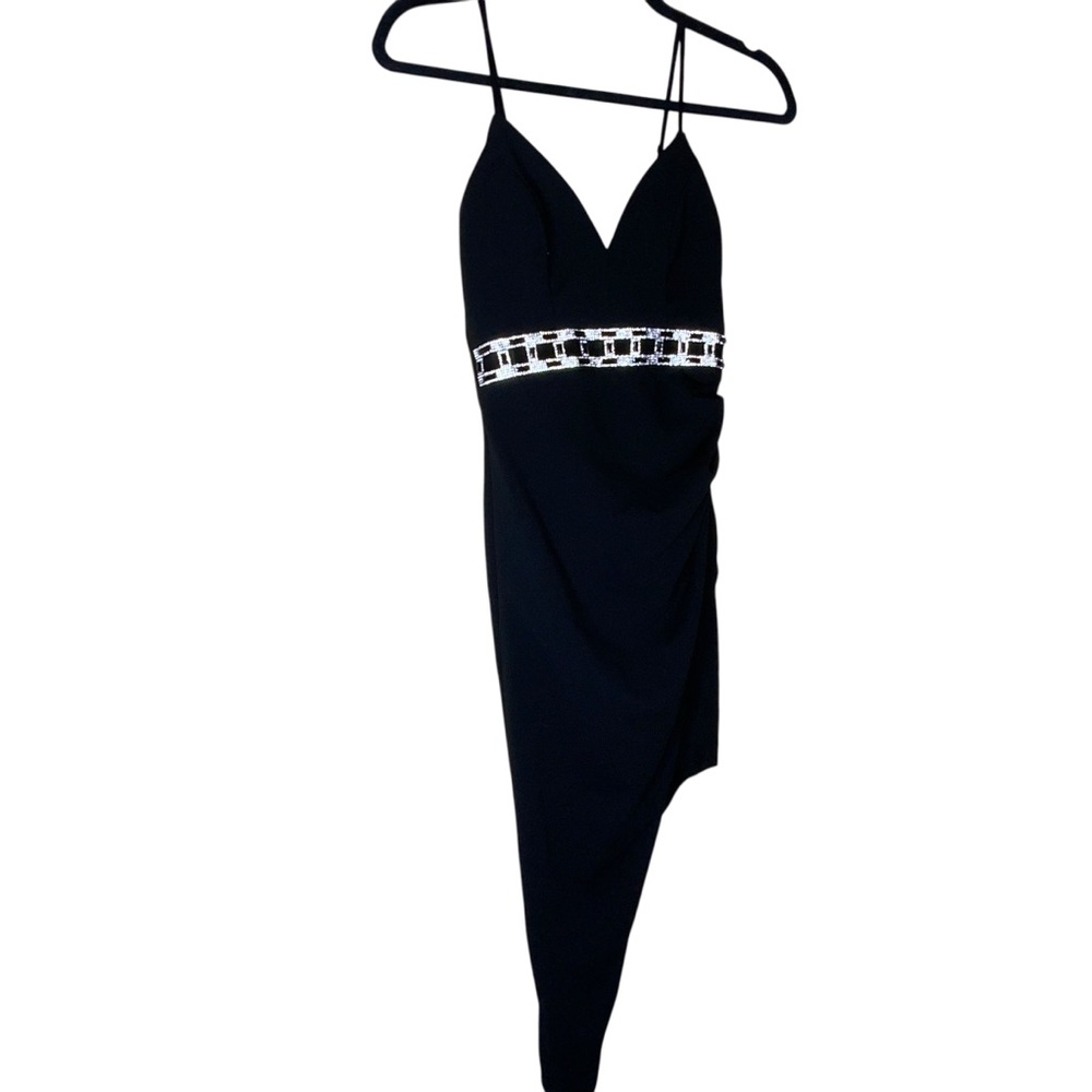This stylish and elegant Black Dress is perfect for a formal like event. XXS